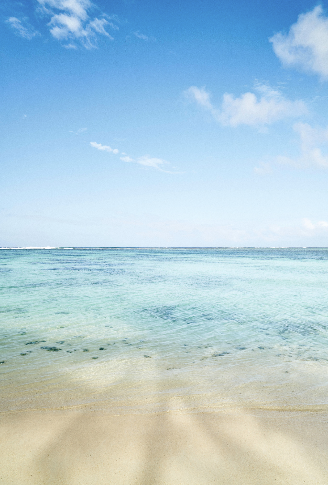 Stampa fotografica limitata del mare di Rarotonga con acqua turchese e sabbia chiara