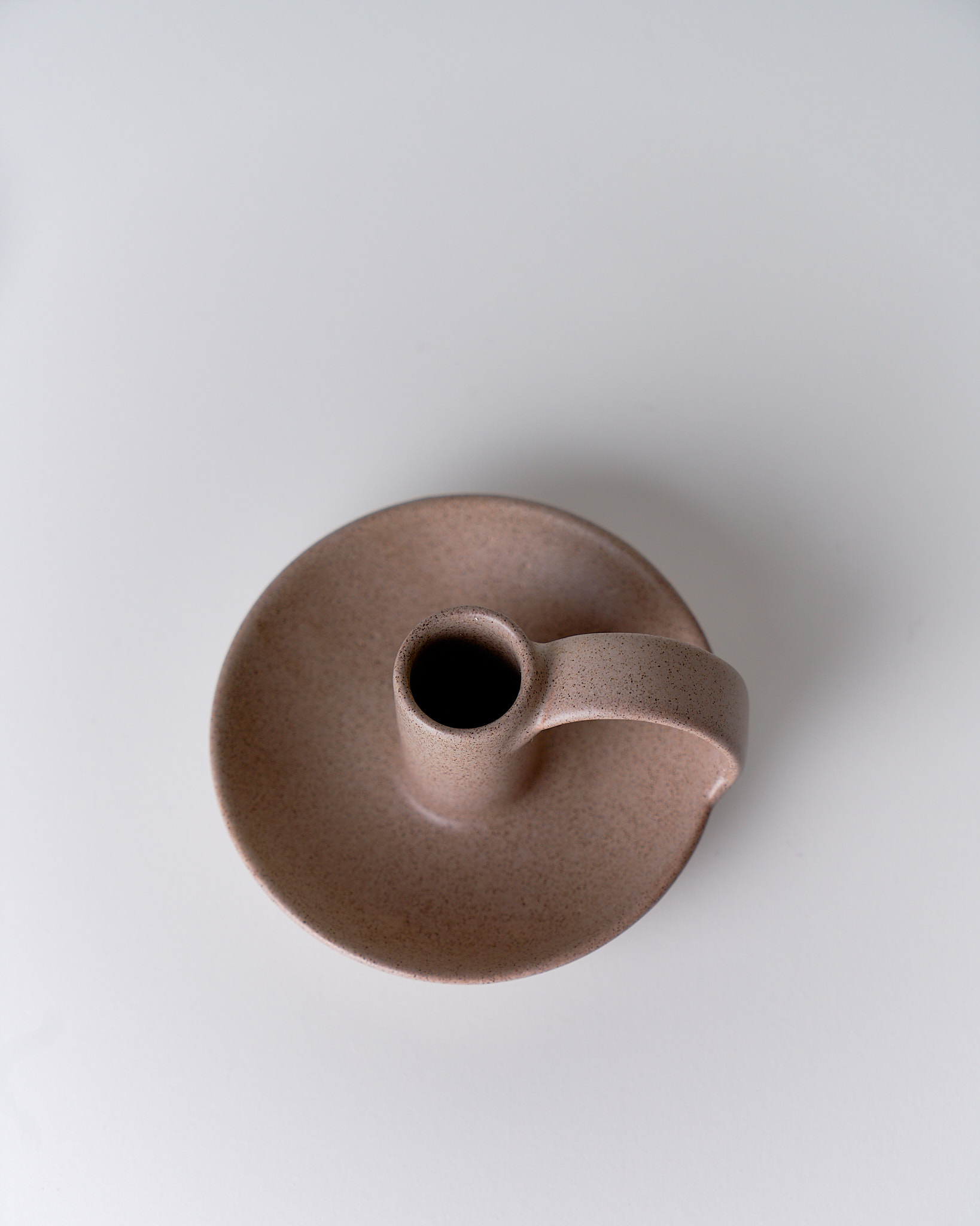 Porta candela in ceramica artigianale, finitura opaca e forme morbide, Terracotta Home Store.