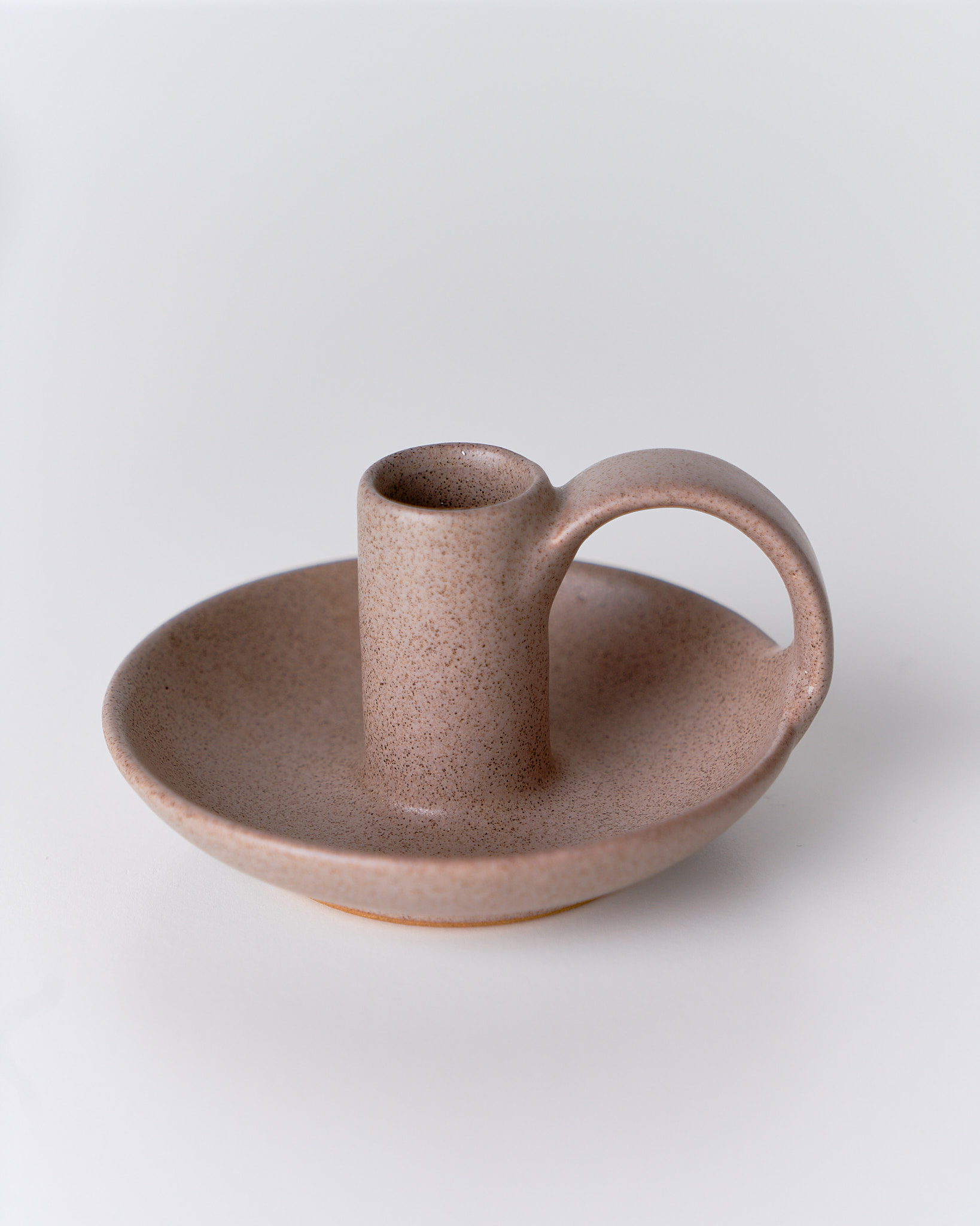 Porta candela in ceramica artigianale, finitura opaca e forme morbide, Terracotta Home Store.